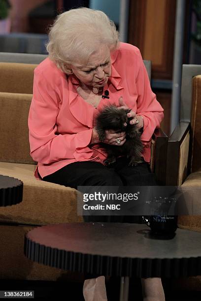Episode 3826 -- Pictured: Actress Betty White handles a baby porcupine during an interview on May 12, 2010