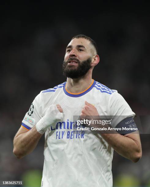 Karim Benzema of Real Madrid CF celebrates scoring their third goal during the UEFA Champions League Round Of Sixteen Leg Two match between Real...