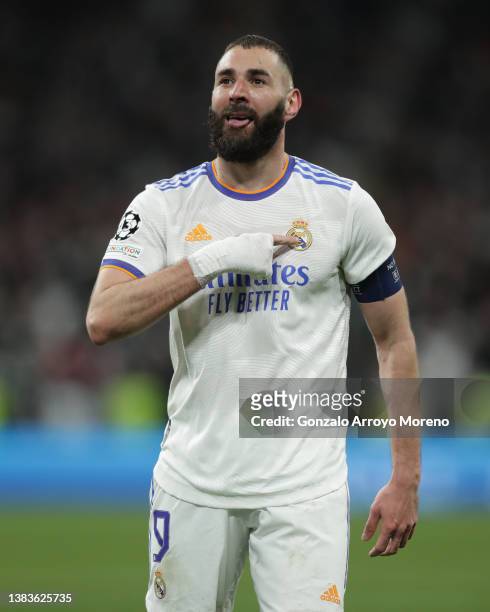 Karim Benzema of Real Madrid CF celebrates scoring their third goal during the UEFA Champions League Round Of Sixteen Leg Two match between Real...