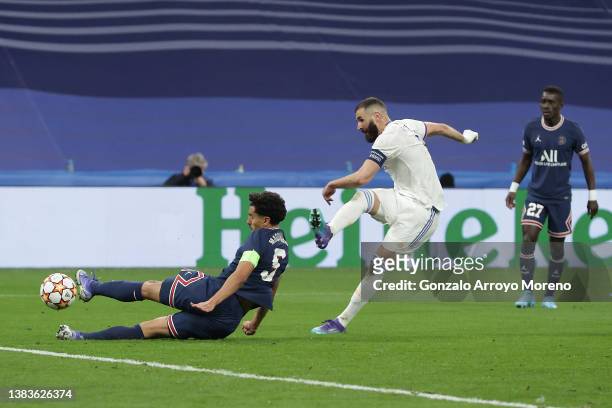 Karim Benzema of Real Madrid CF scores their second goal during the UEFA Champions League Round Of Sixteen Leg Two match between Real Madrid and...