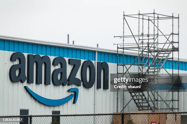 amazon prime distribution centre - amazon packages stock pictures, royalty-free photos & images