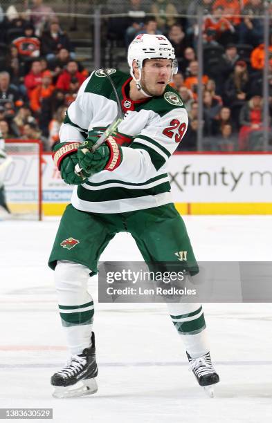 Dmitry Kulikov of the Minnesota Wild completes a pass against the Philadelphia Flyers at the Wells Fargo Center on March 3, 2022 in Philadelphia,...