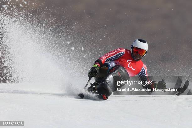 Jasmin Bambur of Team United States competes during the Men's Giant Slalom Sitting Run 1 on day six of the Beijing 2022 Winter Paralympics at Yanqing...