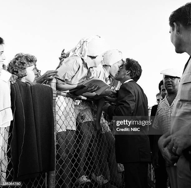 Pictured: Elvis Presley, manager Colonel Tom Parker arrive in Miami, FL.