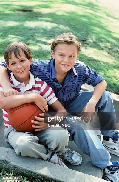 Pictured: Max Elliott Slade as Kevin Buckman, Leonardo DiCaprio as Garry Buckman