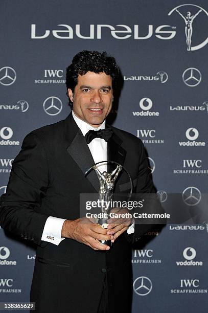 Rai Souza Vieira De Oliveira poses with his Laureus Sport For Good trophy in the press room at the 2012 Laureus World Sports Awards at Queen...
