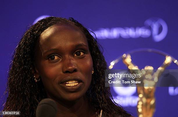Long distance runner Vivian Cheruiyot talks to the media after winning the Laureus World Sportswoman of the Year award at the 2012 Laureus World...
