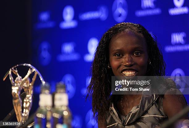 Long distance runner Vivian Cheruiyot talks to the media after winning the Laureus World Sportswoman of the Year award at the 2012 Laureus World...