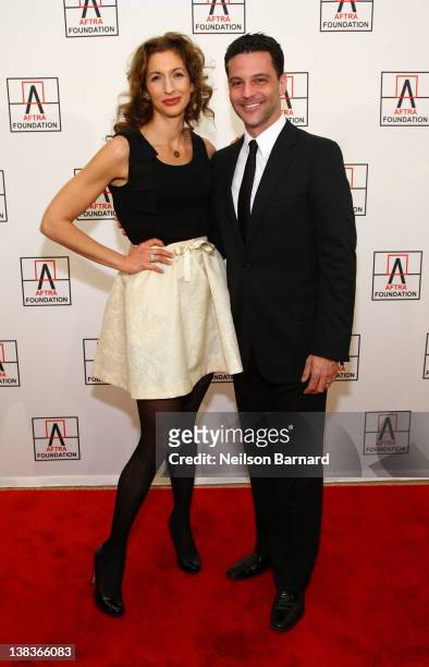 Actress Alysia Reiner and actor David Alan Basche attend the AFTRA Foundation's 2012 AFTRA Media and Entertainment Excellence Awards in the Grand...