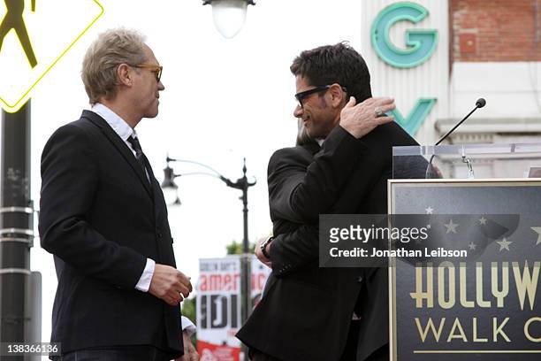 Gerry Beckley, Dewey Bunnell and John Stamos attend the musical group America honored on the Hollywood Walk of Fame Induction Ceremony on February 6,...