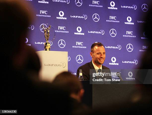 Oscar Pistorius talks to the media after winning the Laureus World Sportsperson of the Year with a Disability award at the 2012 Laureus World Sports...