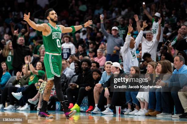 Jayson Tatum of the Boston Celtics celebrates in the fourth quarter during their game against the Charlotte Hornets at Spectrum Center on March 09,...