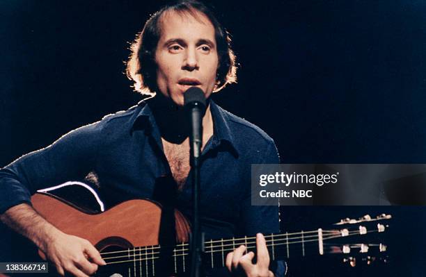 Episode 8 -- Pictured: Musical guest Paul Simon performs on November 20, 1976