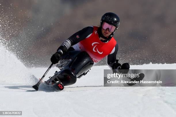 Aaron Ewen of Team New Zealand competes during the Men's Giant Slalom Sitting Run 1 on day six of the Beijing 2022 Winter Paralympics at Yanqing...