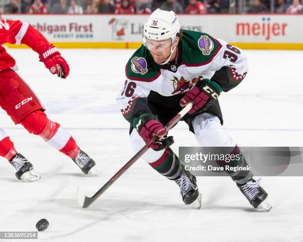 Christian Fischer of the Arizona Coyotes skates up ice with the puck against the Detroit Red Wings during the second period of an NHL game at Little...