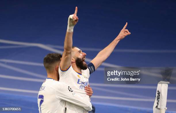 Karim Benzema of Real Madrid celebrates his second goal during the UEFA Champions League Round Of Sixteen Leg Two match between Real Madrid and Paris...