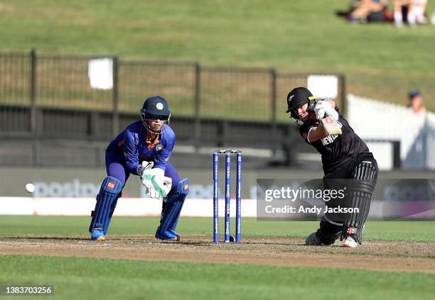 Katey Martin of New Zealand bats against Richa Ghosh of India during the 2022 ICC Women's Cricket World Cup match between New Zealand and India at...