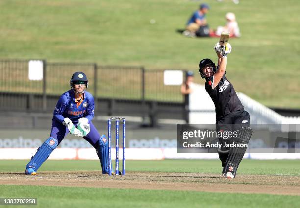 Katey Martin of New Zealand bats against Richa Ghosh of India during the 2022 ICC Women's Cricket World Cup match between New Zealand and India at...