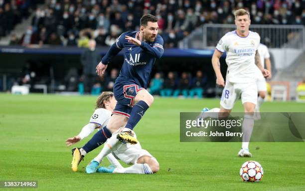 Lionel Messi of PSG during the UEFA Champions League Round Of Sixteen Leg Two match between Real Madrid and Paris Saint-Germain at Estadio Santiago...
