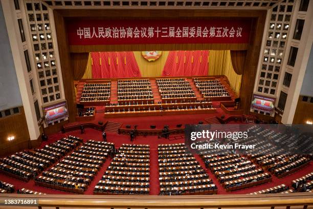 Chinese President Xi Jinping and other members of the government take part in the closing session of the Chinese People's Political Consultative...