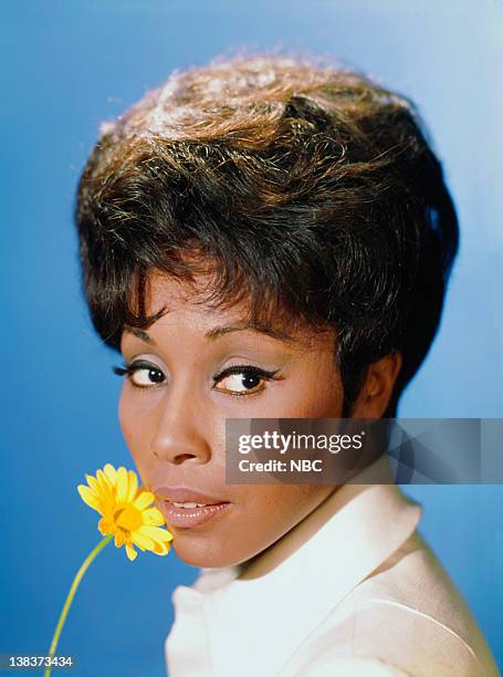 Diahann Carroll as Julia Baker