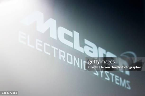The McLaren Electronic Systems logo etched in to a glass window at the British architect Sir Norman Foster, Foster + Partners designed McLaren...