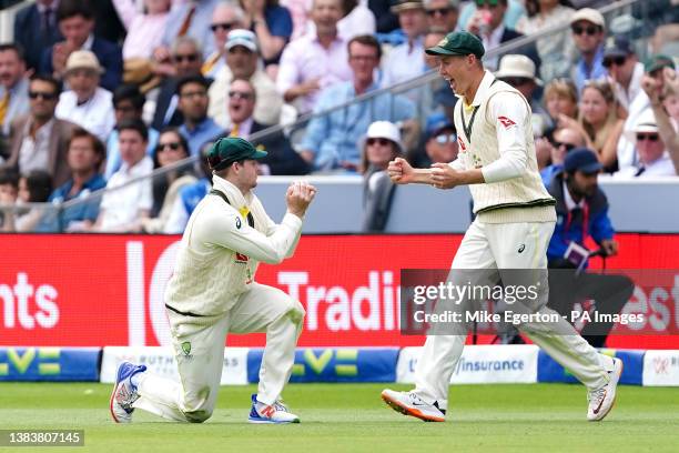 Australia's Steven Smith catches the ball of England's Ollie Robinson as team-mate Marnus Labuschagne celebrates during day five of the second Ashes...