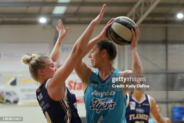 Jenna O’Hea of the Flyers in action against Shyla Heal of the Flames during the round 14 WNBL match between Southside Flyers and Sydney Flames at...