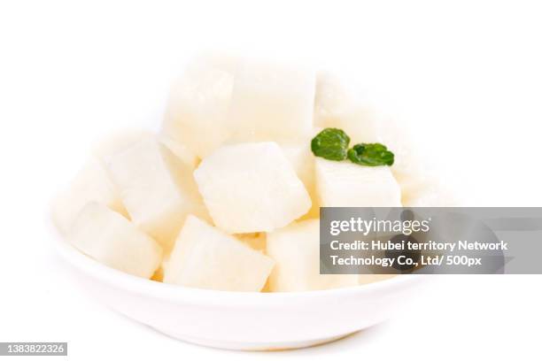 white sweet potatoes are placed on the white background - jicama 個照片及圖片檔