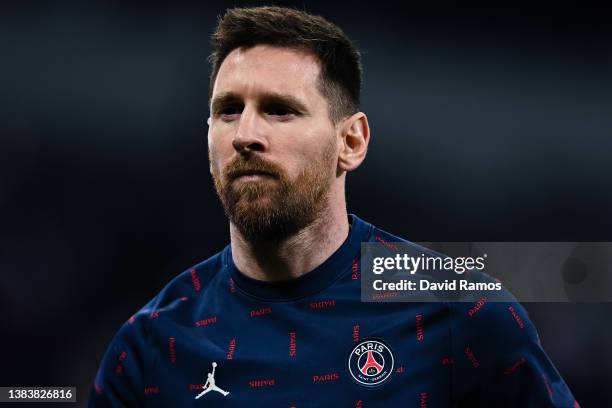 Lionel Messi of Paris Saint-Germain looks on during the warm up prior to the UEFA Champions League Round Of Sixteen Leg Two match between Real Madrid...