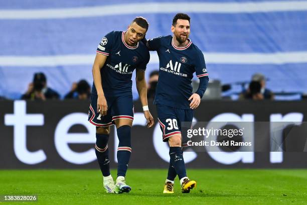 Kylian Mbappe of Paris Saint-Germain celebrates after scoring his team's first goal with Lionel Messi of Paris Saint-Germain during the UEFA...