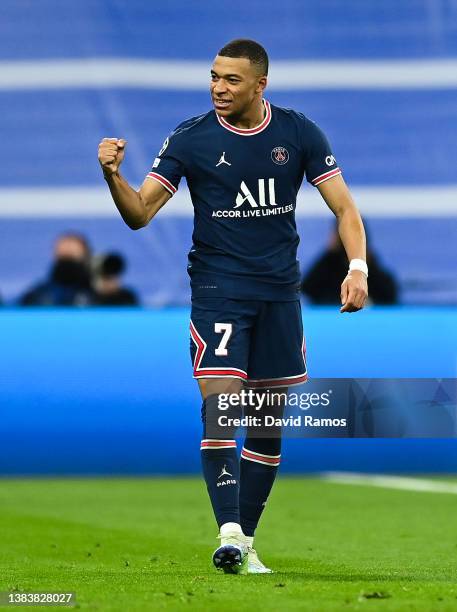 Kylian Mbappe of Paris Saint-Germain celebrates after scoring his team's first goal during the UEFA Champions League Round Of Sixteen Leg Two match...