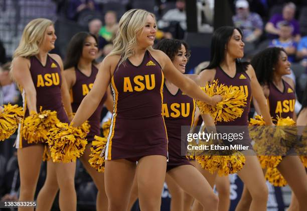 Arizona State Sun Devils cheerleaders perform during the team's game against the Stanford Cardinal in the first round of the Pac-12 Conference...