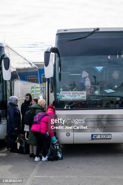 people leaving ukraine by bus to warsaw - warsaw bus stock pictures, royalty-free photos & images