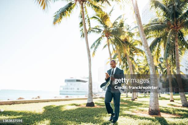 busy business man on the marina of miami - brickell avenue stock pictures, royalty-free photos & images