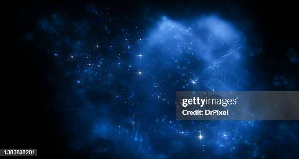 blue fog and sparkles against dark background - blue galaxy stock pictures, royalty-free photos & images