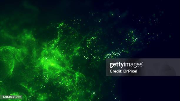 green fog and particles against dark background - liquid galaxy stock pictures, royalty-free photos & images