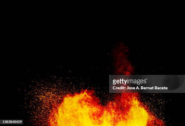 fire and smoke from an explosion on a black background. - abfeuern stock-fotos und bilder