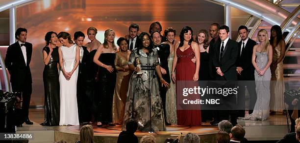 64th ANNUAL GOLDEN GLOBE AWARDS -- Pictured: Winner of Best Television Series Drama, Grey's Anatomy cast and crew, on stage Patrick Dempsey, Sandra...