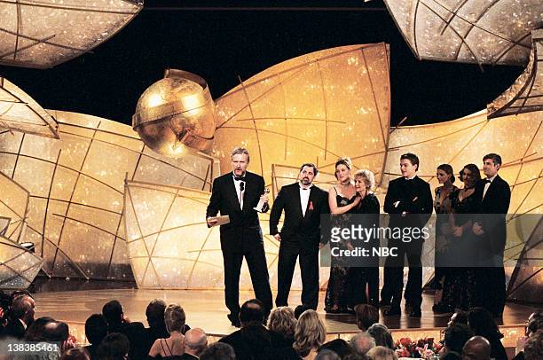 Season 55 -- Pictured: Golden Globe winner for best Picture - Drama "Titanic" James Cameron and the cast of the movie on stage during the 55th Annual...