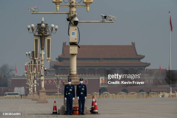 Chinese fire and rescue officers stand in Tiananmen Square after the closing session of the Chinese Peoples Political Consultative Conference at the...