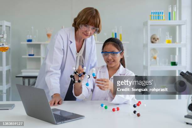 educational students use plastic atom model educational toys - glucose molecule stock pictures, royalty-free photos & images