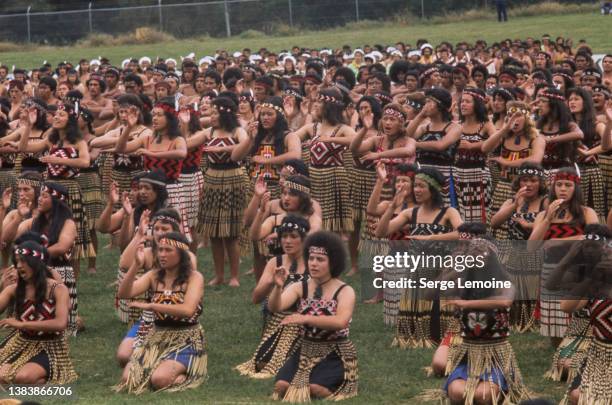 Maori tribespeople in traditional clothing welcome British Royal Queen Elizabeth ll during her visit to Rugby Park in Gisborne, New Zealand, 17th...