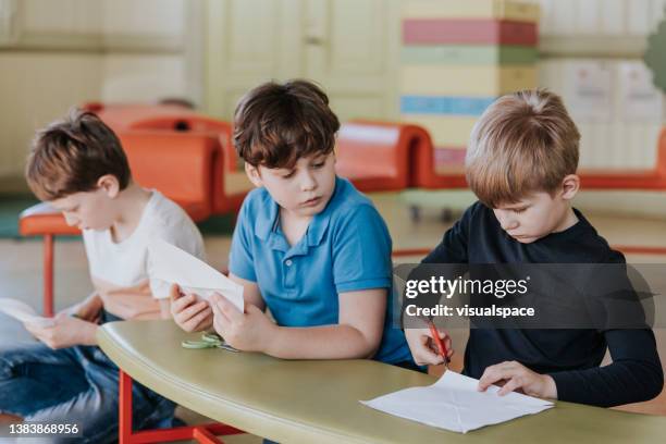 children learning about sustainability and renewable energy - estonia school stock pictures, royalty-free photos & images