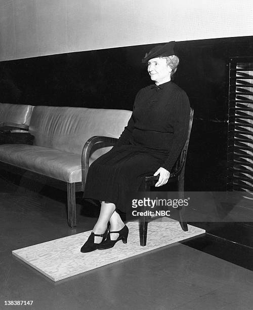 Pictured: Helen Keller listening to the NBC Symphony by using a special listening board in 1938