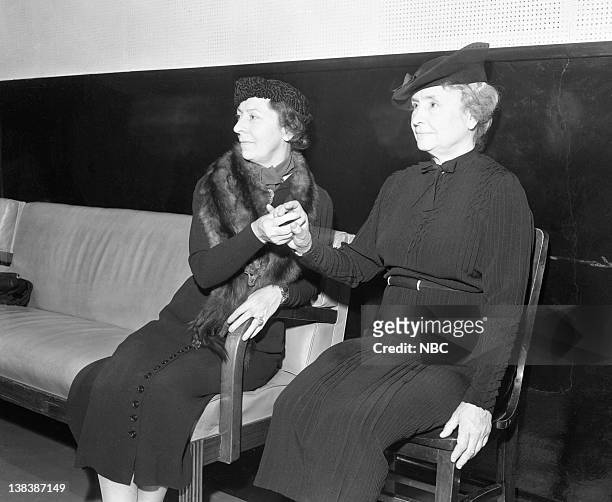 Pictured: ,Aid/companion Polly Thompson, Helen Keller listening to the NBC Symphony by using a special listening board in 1938
