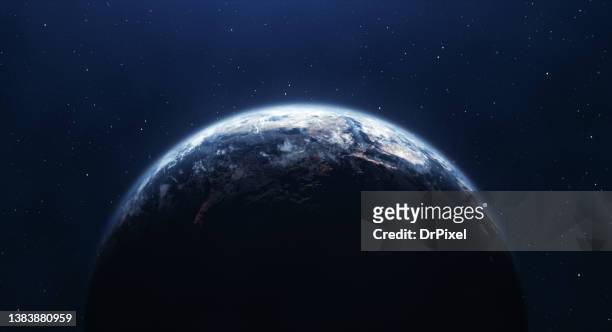 planet earth and dark space with stars - textfreiraum stock-fotos und bilder