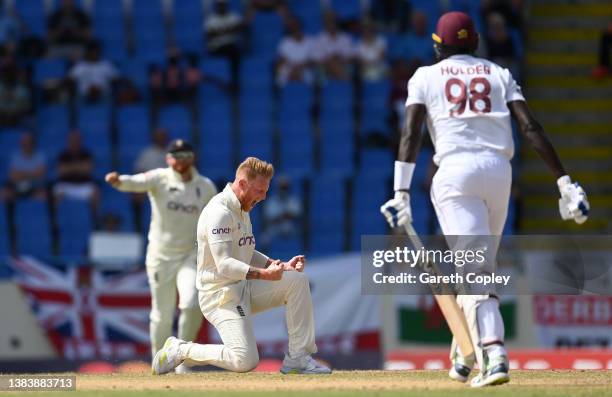 Ben Stokes of England celebrates dismissing Jason Holder of the West Indies during day three of the first test match between West Indies and England...