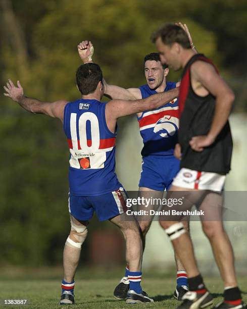 Stephen Crisp of UNSW celebrates after a goal during the Sydney AFL Grand Final between North Shore and UNSW-ES held at the Roger Sheeran Oval in...