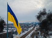 The aerial view of the Ukraine flag in winter